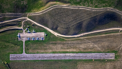 Abandoned aircraft field wirn AN-2 on it