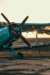 Abandoned aircraft field wirn AN-2 on it