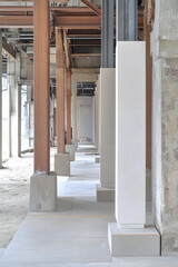 Obraz premium Modern architecture showcases white columns and open space in urban construction site
