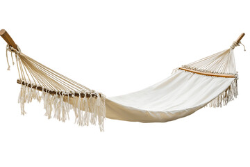 Hanging woven cotton hammock with fringe details, isolated on white.