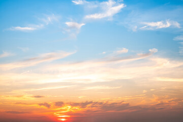 Sky,sunset, beautiful , luxury soft gradient orange gold clouds and sunlight on the blue sky perfect for the background, Sunrise on morning or everning in winter warm time ,Twilight summer,silhouette