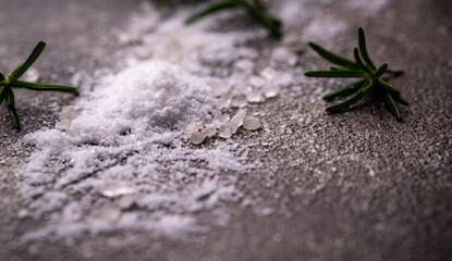 Natural sea salt crystals on dark background