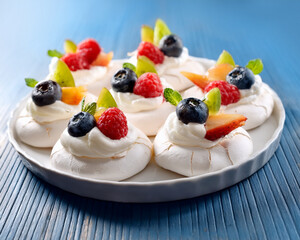 A delicious fruit cake with fresh berries like strawberry and raspberry, a sweet pastry dessert