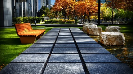 Modern urban park scene featuring a wooden bench, stone pathway, and vibrant autumn foliage