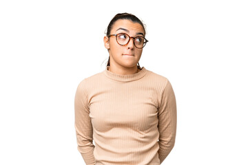 Young beauty woman over isolated chroma key background having doubts while looking up