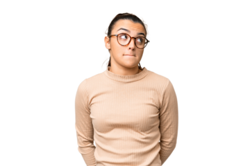 Young beauty woman over isolated chroma key background having doubts while looking up