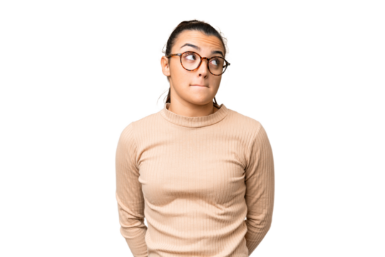 Young beauty woman over isolated chroma key background having doubts while looking up