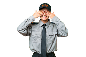Young safeguard woman over isolated chroma key background covering eyes by hands