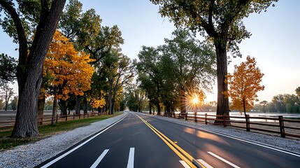 Obraz premium Dreamy Sunrise Over Rural American Highway Surrounded by Nature