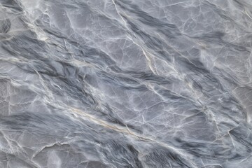 Obraz premium A grey and white marble wall with a pattern of lines