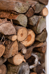 Dry firewood stacked in row.Preparation for winter.A log for kindling fireplace