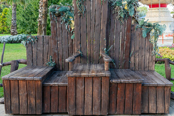 Decorative Wooden Bench With Natural Accents in a Lush Garden Setting