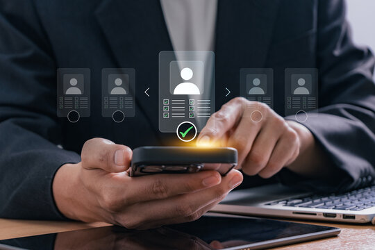 HR tech recruitment process displayed with businessman screening and approving applicant on smartphone, representing modern hiring system, digital resume review, and mobile human resource technology