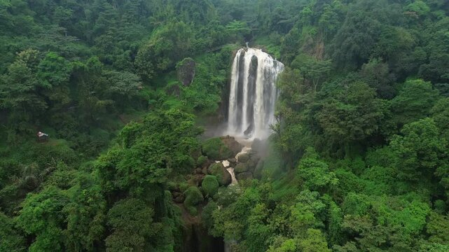Stunning Drone View of the Grand Curug Sewu Waterfall in Patean, Kendal