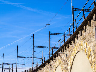 Stone Railway Viaduct in Zurich with Overhead Power Lines