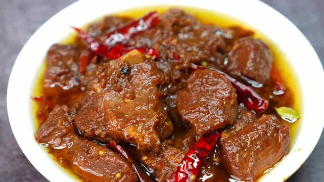 Mutton Curry &ndash; A spicy, slow-cooked Indian dish with tender mutton in a rich, aromatic gravy. A popular non-veg delicacy enjoyed in restaurants, street food stalls, and home-cooked meals worldwide.