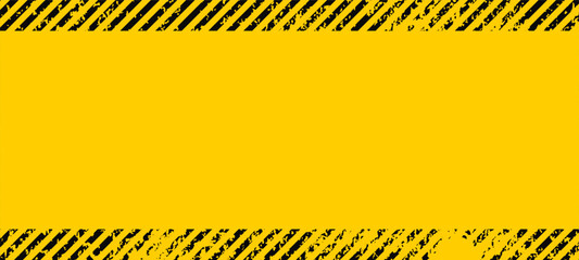 Grunge yellow and black diagonal stripes. Industrial warning background, warn caution, construction, safety
