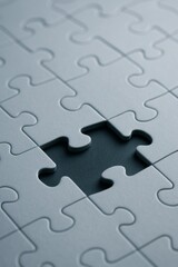 Fototapeta premium A close-up of a jigsaw puzzle with one piece missing in the center.