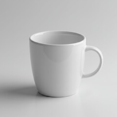 simple white ceramic coffee mug with a smooth, glossy surface and a classic shape