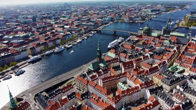 Aerial view of Copenhagen, Denmark, showcasing vibrant rooftops and waterways  