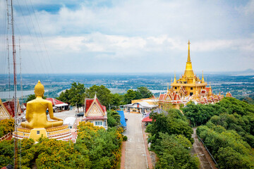 Wat Khiriwong, the highlight is the Ubosot and Phra Chulamani Chedi, located on the top of Khao...
