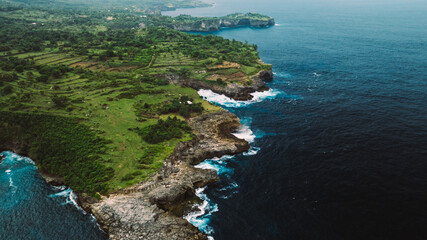Kelingking Beach, Nusa Penida is one of the most incredible place for visit in Indonesia the eyes of travelers have a view amazing natural landscape	
