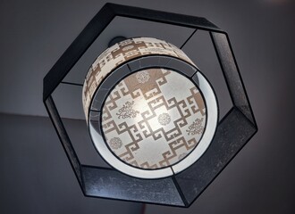 Decorative ceiling light fixture with a unique blend of geometric and floral patterns
