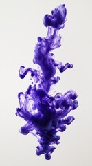 A vibrant swirl of purple ink gracefully dispersing in clear water, creating an artistic display with soft edges, ideal for abstract art or creative design projects