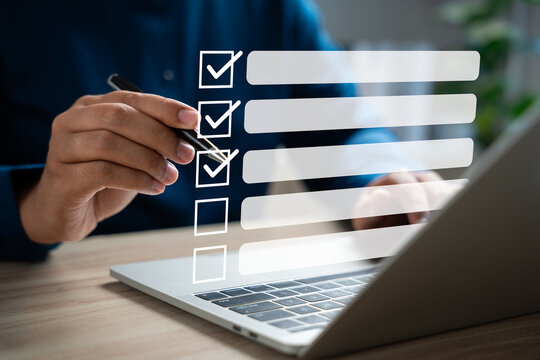 Digital Checklists for efficient business management, Businessman touching marking on checklist guide to paperless assessment and Future Success, Streamlining operations with online surveys.