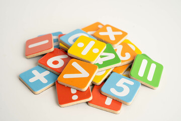 Number wood block cubes for learning Mathematic, education math concept.