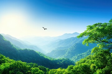 Obraz premium A serene mountainous landscape with lush greenery, rolling hills, and a clear blue sky, showcasing nature's beauty and tranquility.