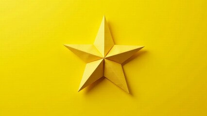 Obraz premium A radiant yellow paper star, meticulously folded, rests on a vibrant yellow backdrop, symbolizing achievement, aspiration, and the pursuit of excellence.