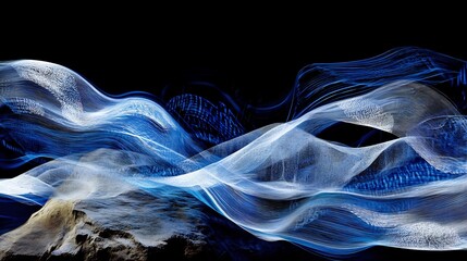 Fototapeta premium Artistic recreation of wave crashing against a rock using vivid blue and white light trails