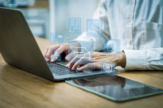 Personal Information Technology, Internet Learning, Network Technology, Online Education, Training, Courses, Off-Campus Learning, Businessman or student learning online on computer and tablet.