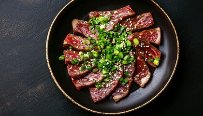 Sliced beef, garnished with green onions, sesame seeds