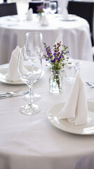 Fototapeta premium elegant restaurant table setting with white linens glassware and purple flowers
