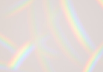 Scattered soft curved bands of rainbow colours drift with refracted light on transparent background