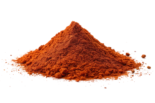 Bright red chili powder in a mound on a white surface, showcasing its vibrant color and fine texture used for cooking