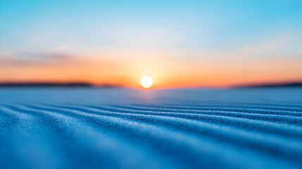 Blue And Orange Winter Sunset Over Snow Covered Landscape