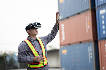 Asia worker man use VR headset working with checking container at container site	