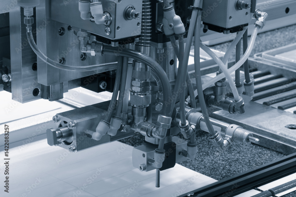 Leinwandbilder A machine with many tubes and wires is in operation. Concept of precision and complexity, as the various components work together to create a finished product. Scene is one of efficiency