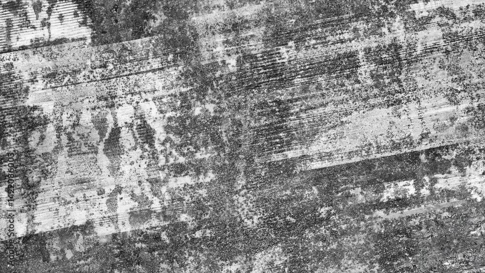 Fototapete Gray wall with many cracks holes scratches and marks. wall is made of concrete and has a rough texture as an abstract texture background for template pages and banners.
