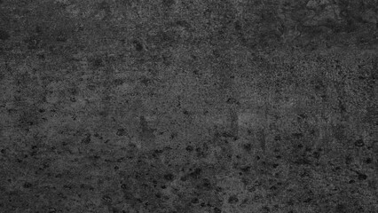 Dark black rough textured abstract background