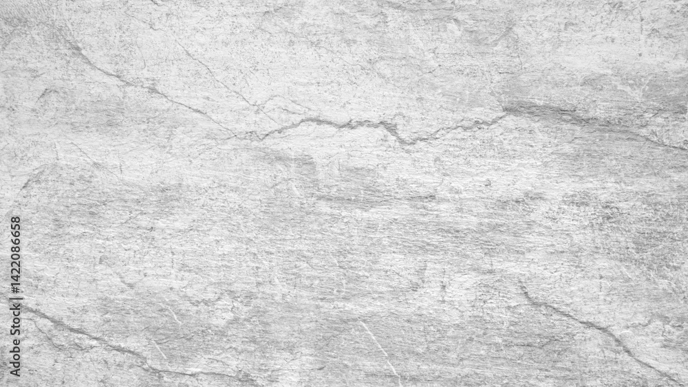 Aufkleber a white background with a grey stone wall. the wall is rough and has a lot of texture.