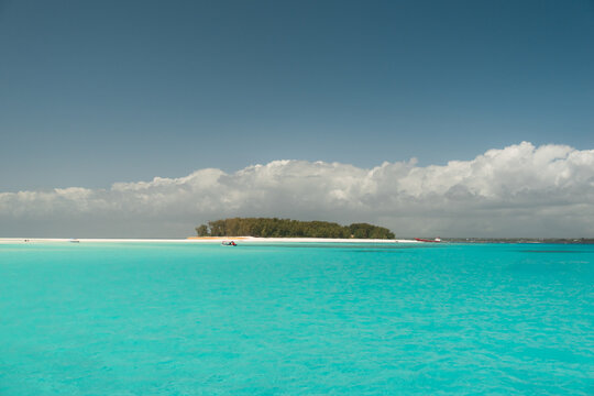 Serene turquoise waters surrounding mnemba atoll