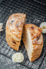 Freshly baked bread with a golden crust on a rack