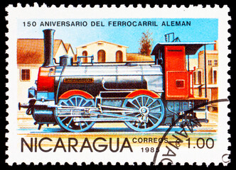 Postage stamp of Magyar with a retro train.