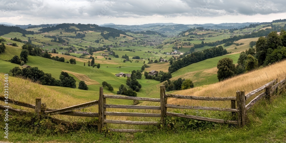 Poster beautiful countryside scene with a fence in the foreground and a lush green field in the background.