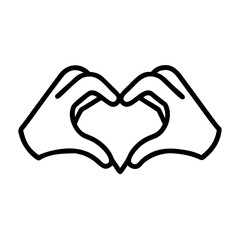 Fototapeta premium Hands forming a heart shape symbolizing love and connection during a warm gathering or celebration