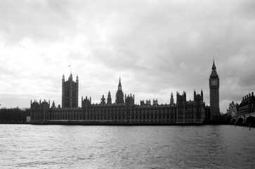 Fototapeta premium Vintage grainy analog photo of palace of westminster and big ben in london